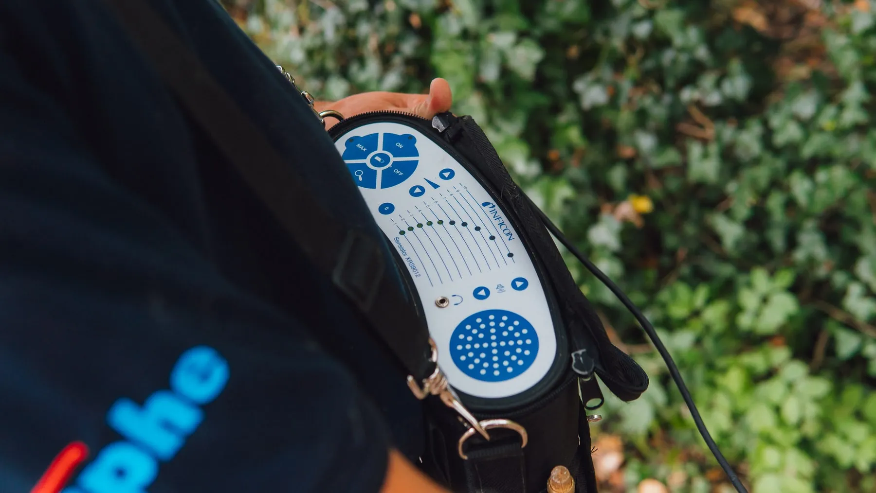 INFICON hydrogen tracer-gas detector carried by an ADI engineer